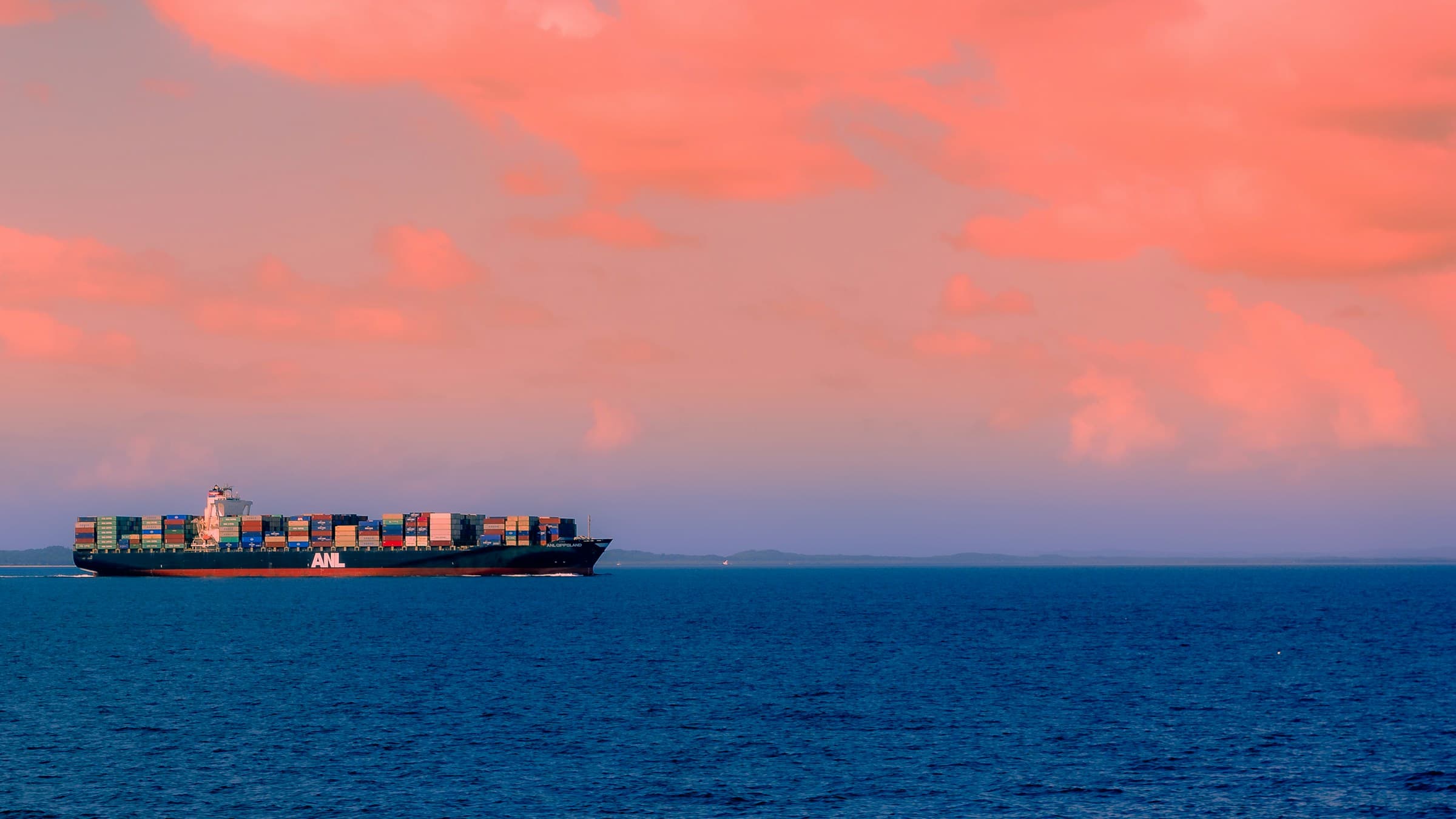 A container ship crossing open water